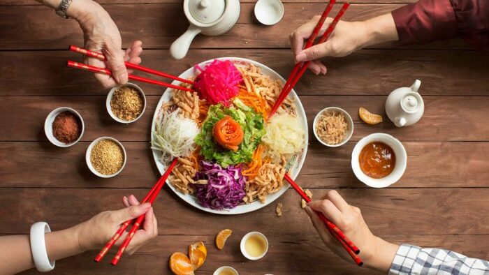Chinese new year food, raw fish salad “Yusheng”.